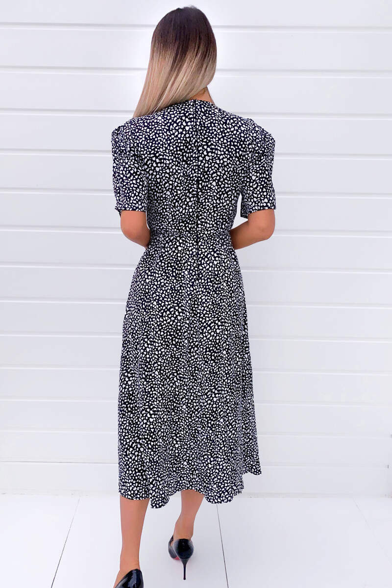 Chic Black Midi Dress with Unique Print and Stylish Split Hem