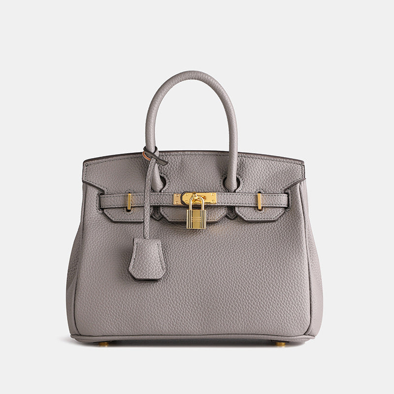 Elegant Women's Structured Handbag with Top Handles and Gold-Tone Accents